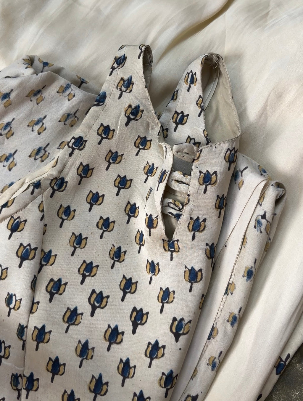 Folded fabric with a floral pattern on a white background